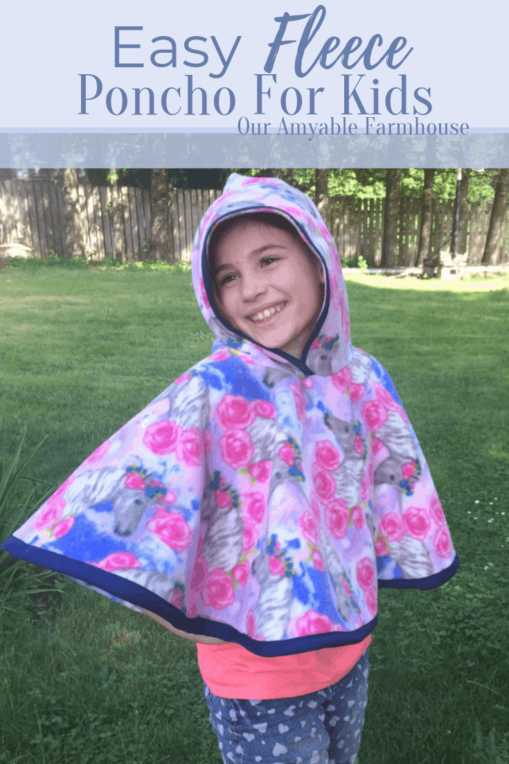Easy Fleece Poncho for Kids. Our Amyable Farmhouse. Girl wearing hooded poncho.